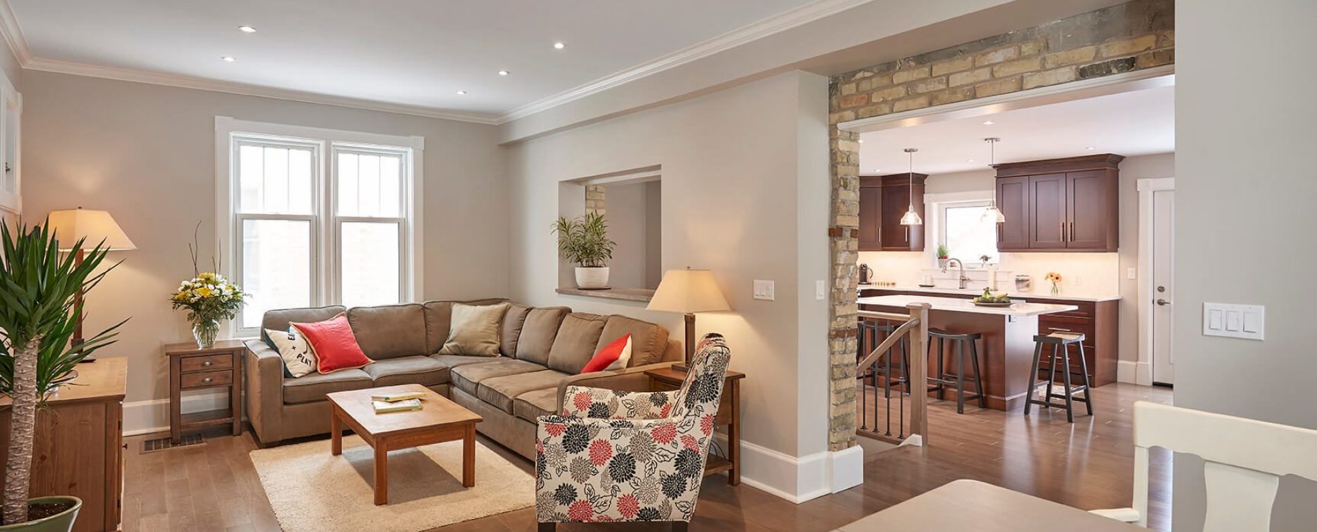 	 	Opening up this space did a world of wonders for the flow from the kitchen to the living room with this custom addition feature.
	 